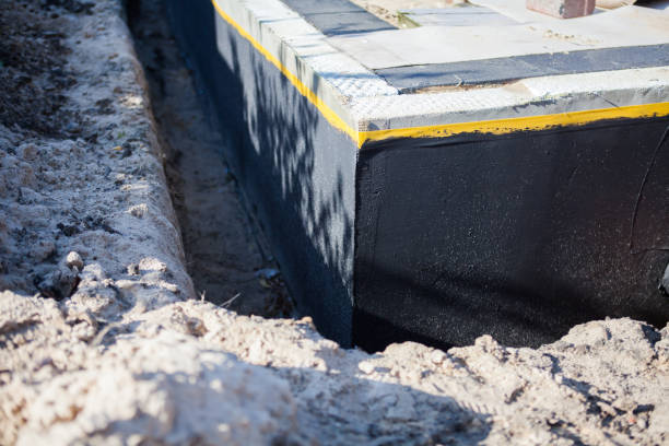 Professional Emergency Waterproofing technician working in Marysville, OH